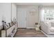 Bright living room showcasing hardwood floors and natural light at 89 E Walnut St, Fountaintown, IN 46130