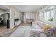 Open-concept living room with stylish decor and hardwood floors at 89 E Walnut St, Fountaintown, IN 46130