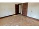 Angle view of a bedroom showing floors and doors, emphasizing the room's layout and potential at 918 N Dearborn St, Indianapolis, IN 46201