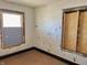 Bedroom corner featuring a boarded-up window at 918 N Dearborn St, Indianapolis, IN 46201