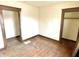 Bedroom with hardwood floors and closet space at 918 N Dearborn St, Indianapolis, IN 46201