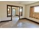 Open-concept living room featuring original wood columns and natural light, ideal for remodeling at 918 N Dearborn St, Indianapolis, IN 46201
