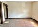 Living room featuring hardwood floors, window and door to the front yard at 918 N Dearborn St, Indianapolis, IN 46201