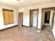 Living room featuring hardwood floors, window and doorway at 918 N Dearborn St, Indianapolis, IN 46201