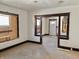 Living room featuring hardwood floors, window and door to the front yard at 918 N Dearborn St, Indianapolis, IN 46201
