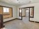 A fixer-upper home featuring outdated design, damaged walls, and boarded-up windows at 918 N Dearborn St, Indianapolis, IN 46201