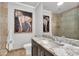 Elegant bathroom featuring a granite countertop, modern fixtures, and a glass-enclosed shower at 958 Tamarack Cir N Dr, Indianapolis, IN 46260