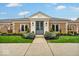 Charming single-story brick home with well-manicured lawn and beautiful landscaping at 958 Tamarack Cir N Dr, Indianapolis, IN 46260