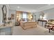 Spacious main bedroom with soft carpet, a king-size bed, and traditional decor at 958 Tamarack Cir N Dr, Indianapolis, IN 46260