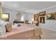 Light-filled main bedroom showcasing a king bed and classic artwork at 958 Tamarack Cir N Dr, Indianapolis, IN 46260