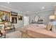 Bright main bedroom with a sitting area and decorative art at 958 Tamarack Cir N Dr, Indianapolis, IN 46260