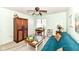 Relaxing room with carpet flooring, a comfortable couch, and natural light, perfect for unwinding after a long day at 963 Wickham Ct # 103, Carmel, IN 46032