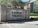 Lenox Trace community sign at entrance shows well maintained grounds and landscaping at 963 Wickham Ct # 103, Carmel, IN 46032