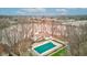 Aerial view showcasing home with pool, and neighborhood amenities at 102 Knoll Ct # D, Noblesville, IN 46062