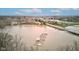 Scenic aerial view of the neighborhood, lake access, and boat docks nearby at 102 Knoll Ct # D, Noblesville, IN 46062