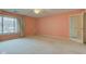 Spacious bedroom with large window providing ample natural light at 102 Knoll Ct # D, Noblesville, IN 46062