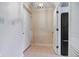 Bright condo entryway with white walls, tile flooring, a closet, and a view of the interior at 102 Knoll Ct # D, Noblesville, IN 46062