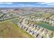 An elevated view of a Gathering-friendly neighborhood featuring tidy streets, lush green spaces, and peaceful ponds at 1075 Barberry Dr, Greenwood, IN 46143