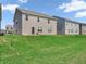 Expansive backyard with green lawn and minimal landscaping at 1075 Barberry Dr, Greenwood, IN 46143