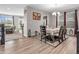 Stylish dining room with wood floors, chandelier, and seamless access to living spaces at 1075 Barberry Dr, Greenwood, IN 46143