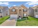 A front aerial view of a brick two-story home at 1075 Barberry Dr, Greenwood, IN 46143