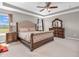 Main bedroom boasting trey ceiling, a stylish ceiling fan and two windows at 1075 Barberry Dr, Greenwood, IN 46143