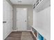 Inviting mud room with built-in bench, storage cubbies, and hooks for organization at 1075 Barberry Dr, Greenwood, IN 46143