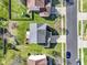 Straight down aerial view of the home and its manicured lawn and neighborhood street at 11741 Langham Crescent Ct, Fishers, IN 46037