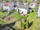 Aerial view of the home's well-maintained lawn, patio, and playset in the backyard at 11741 Langham Crescent Ct, Fishers, IN 46037