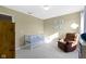 Bright Bedroom with a crib, recliner, neutral walls, and plenty of natural light at 11741 Langham Crescent Ct, Fishers, IN 46037