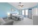 Bright bedroom with natural light, vaulted ceiling, ceiling fan and seating area at 11741 Langham Crescent Ct, Fishers, IN 46037