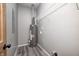 This utility room features vinyl floors, water heater and overhead wire rack at 11975 Civic Cir, Mooresville, IN 46158