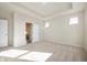 This bedroom features neutral walls, carpet, and a tray ceiling at 12009 Jeff Ct, Noblesville, IN 46060