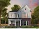 Charming two-story home featuring gray siding, brick accents, and a welcoming front porch at 12009 Jeff Ct, Noblesville, IN 46060