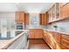 Stylish kitchen with granite countertops, stainless steel appliances and hardwood floors at 12527 Saksons Blvd, Fishers, IN 46038