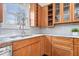 Close-up view of a modern kitchen with granite countertops and a stylish backsplash at 12527 Saksons Blvd, Fishers, IN 46038