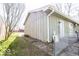 Exterior view of the side of the home with walkway at 12566 S Hillview Dr, Columbus, IN 47201