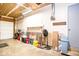 This garage has shelving, a garage door, and lots of storage space at 12566 S Hillview Dr, Columbus, IN 47201