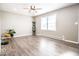Spacious living room with modern flooring, neutral walls, and a bright, airy ambiance at 12566 S Hillview Dr, Columbus, IN 47201