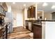 Stylish kitchen with stainless steel appliances, granite countertops, and dark wood cabinetry at 1371 Blackthorne N Trl, Plainfield, IN 46168