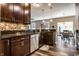 Bright kitchen with stylish cabinetry, stainless steel appliances, and an adjacent dining area at 1371 Blackthorne N Trl, Plainfield, IN 46168