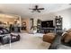 Comfortable living room with neutral tones, a ceiling fan, and plush seating, perfect for relaxation and Gathering gatherings at 1371 Blackthorne N Trl, Plainfield, IN 46168