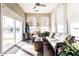 Cozy sunroom with comfortable seating, bright windows, and serene views of the outdoors at 1371 Blackthorne N Trl, Plainfield, IN 46168