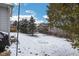 Winter view of backyard featuring snow covered yard and trees at 13982 Avalon Blvd, Fishers, IN 46037