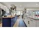 Spacious kitchen showcases a large island, stainless steel appliances, butcher block countertops, and modern finishes at 14019 Colville Cir, Carmel, IN 46033