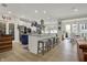 Open concept kitchen with an island, bar stool seating, and stainless steel appliances, ideal for entertaining at 14019 Colville Cir, Carmel, IN 46033
