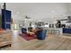Expansive open-concept living area blending a stylish living room with a modern kitchen and dining space at 14019 Colville Cir, Carmel, IN 46033