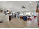 Expansive living area with a view of the kitchen, living room, and dining space at 14019 Colville Cir, Carmel, IN 46033