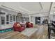 Basement wine cellar features wine storage, space for exercise equipment, and comfortable seating at 14019 Colville Cir, Carmel, IN 46033