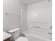 Bright bathroom showcases a white tub and toilet at 14317 Banister Dr, Noblesville, IN 46060
